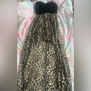 Black and cheetah print dress. Short in the front long in the back. Size small